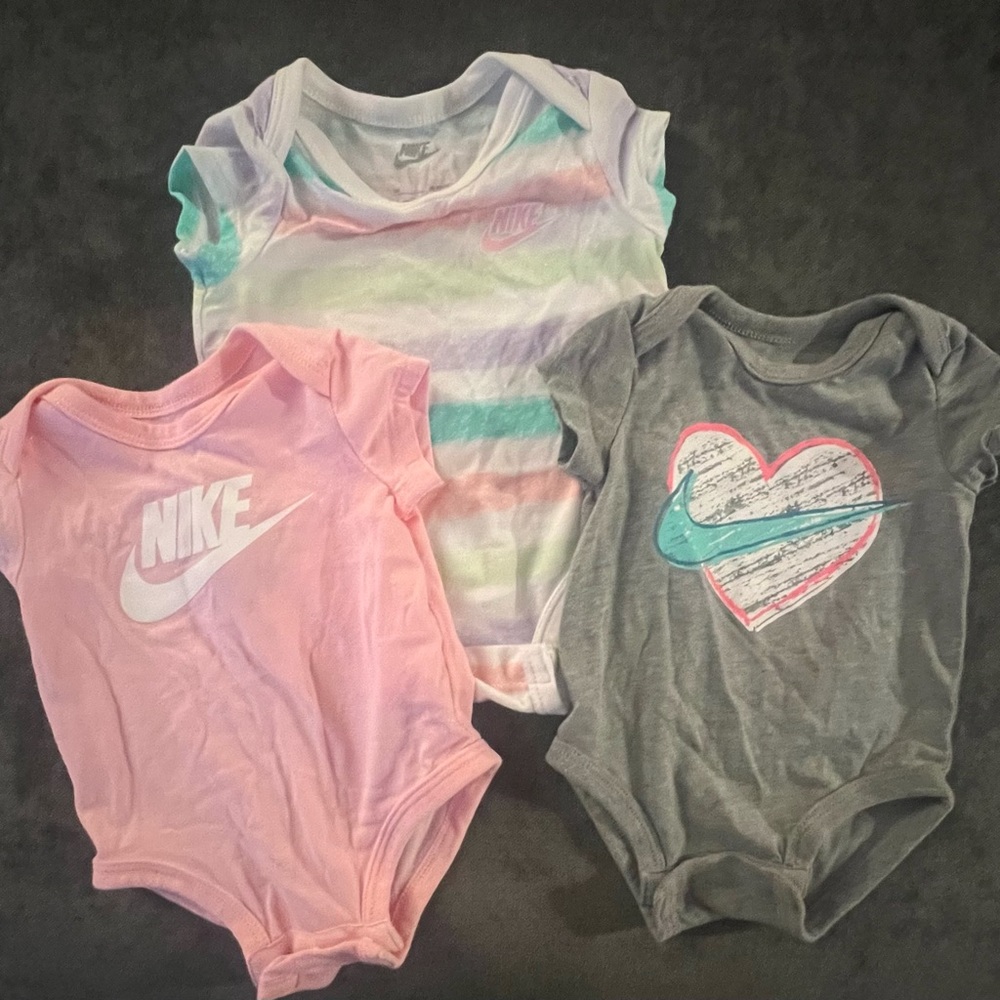 Nike baby girl onesies